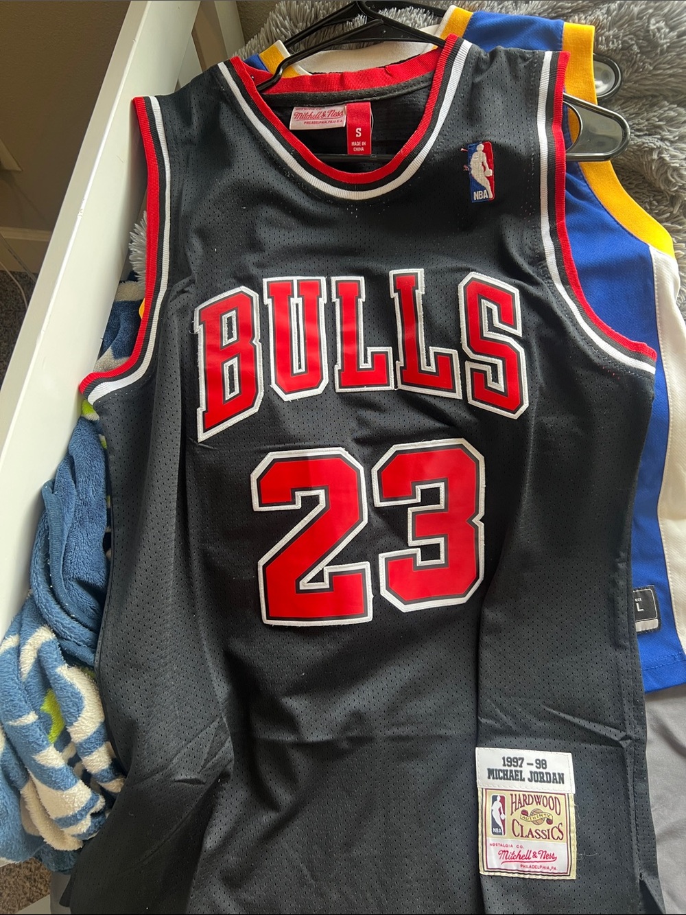 Mitchell & Ness Black Chicago Bulls #23 Replica Jersey with Red & White Trim